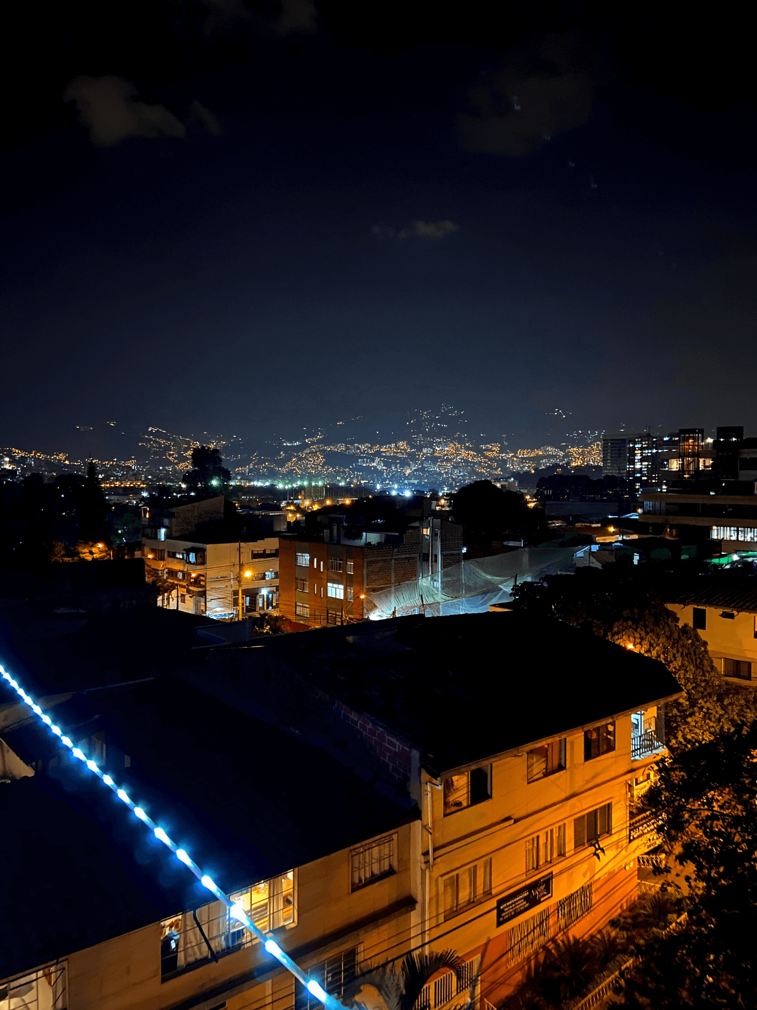 Los Patios Hostel Rooftop Bar at night