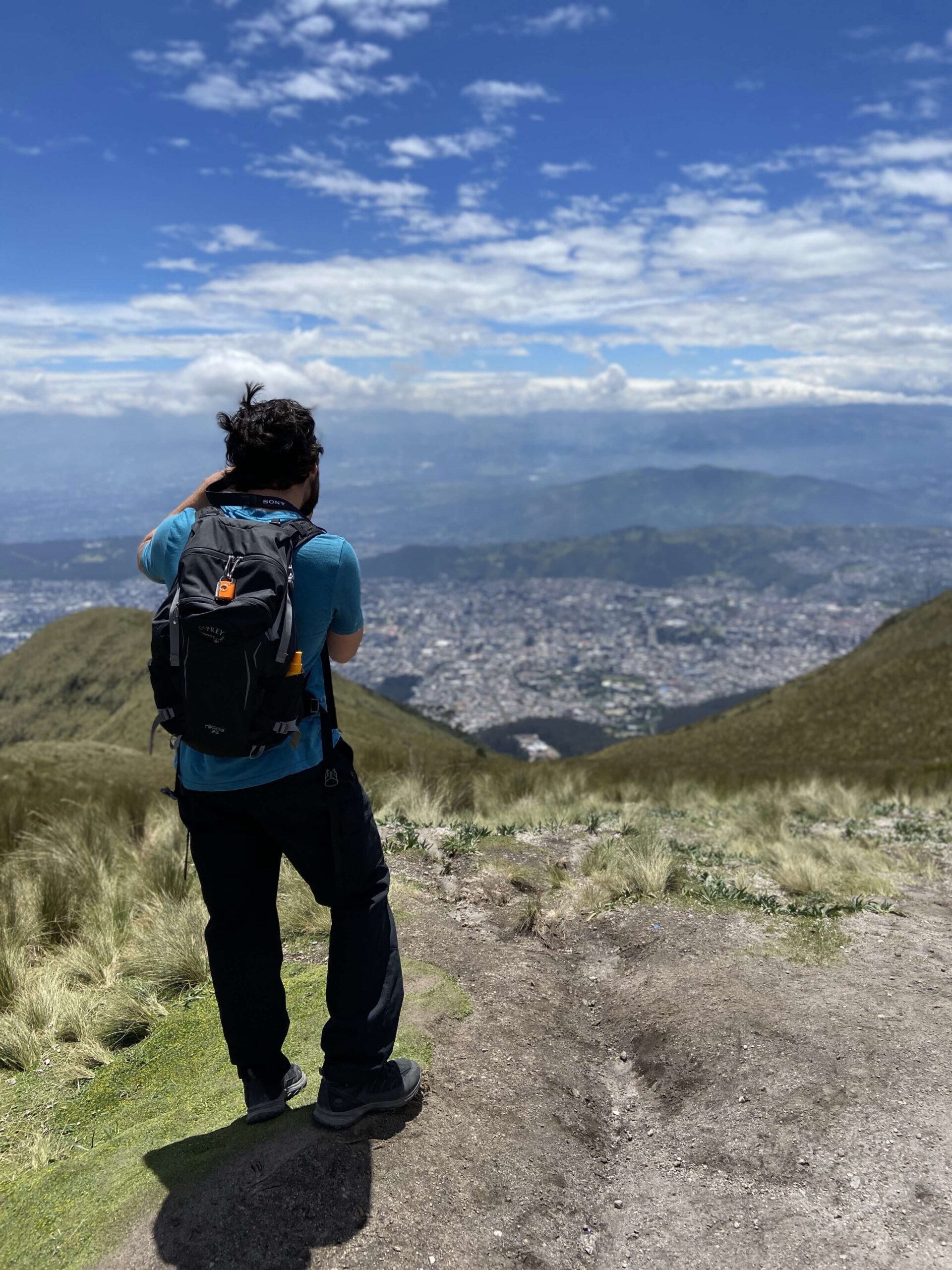 Alex photographing the view of Quito below.