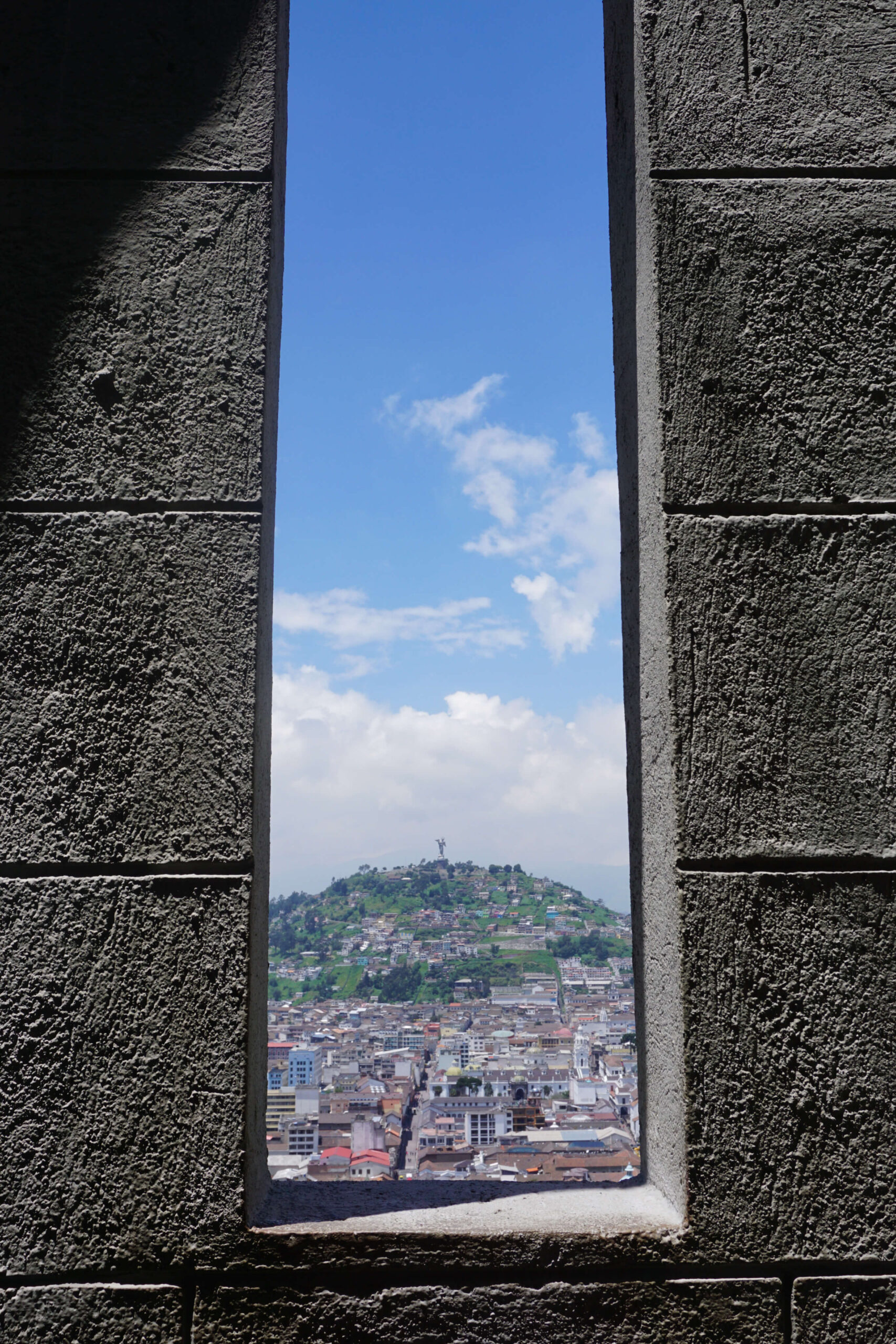 Basilica Del Voto Nacional View through a stone window opening