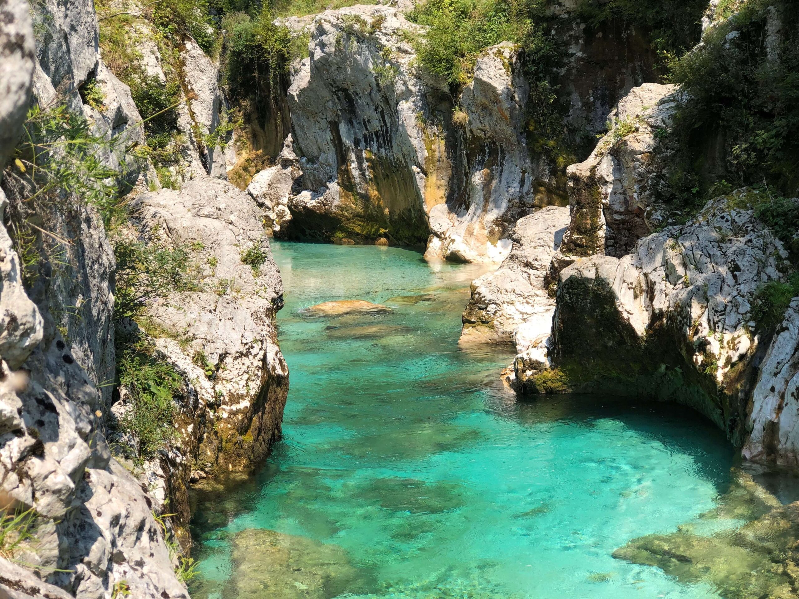 Turquoise Soca River flowing through the Great Soca Gorge